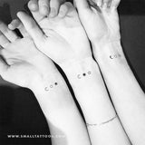 Three matching minimalist moon, sun and star temporary tattoos.