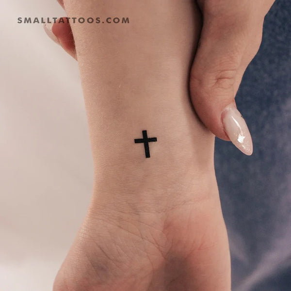 Faith Tattoos: Small cross black tattoo