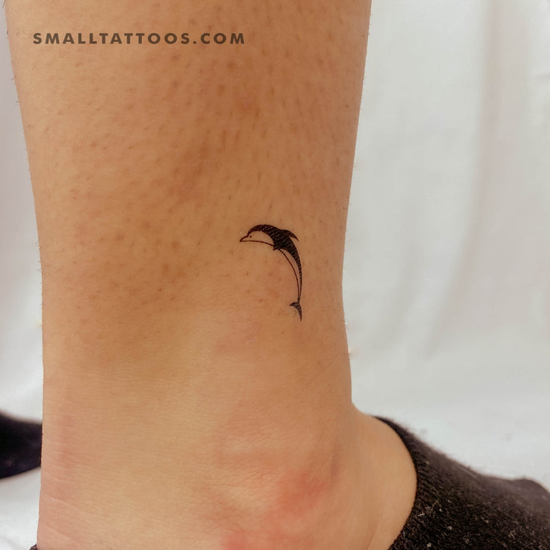 A Simple Dolphin Tattoo 🐬: They symbolize community, friendship and  harmony.Henceforth we see a lot of couples and friends getting s... |  Instagram