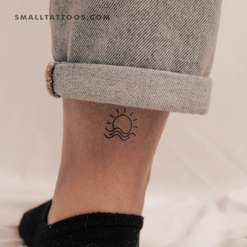 A minimalist tattoo of a picturesque island at sunset on Craiyon