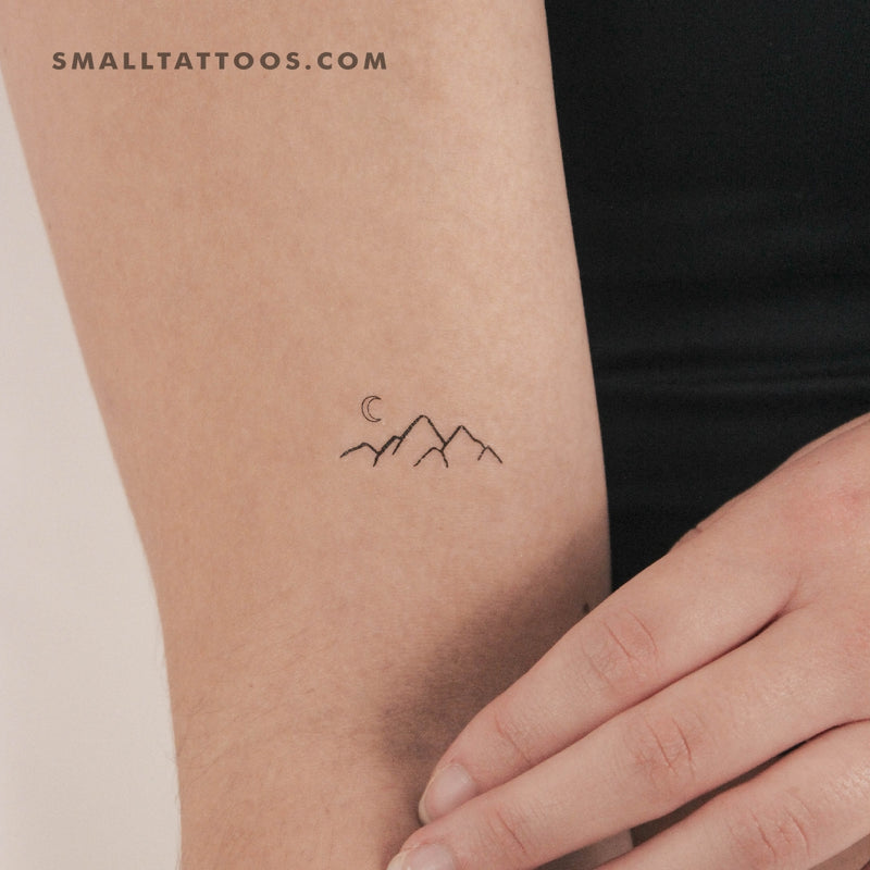 Cute little mountains tattoo hand poked on the inner