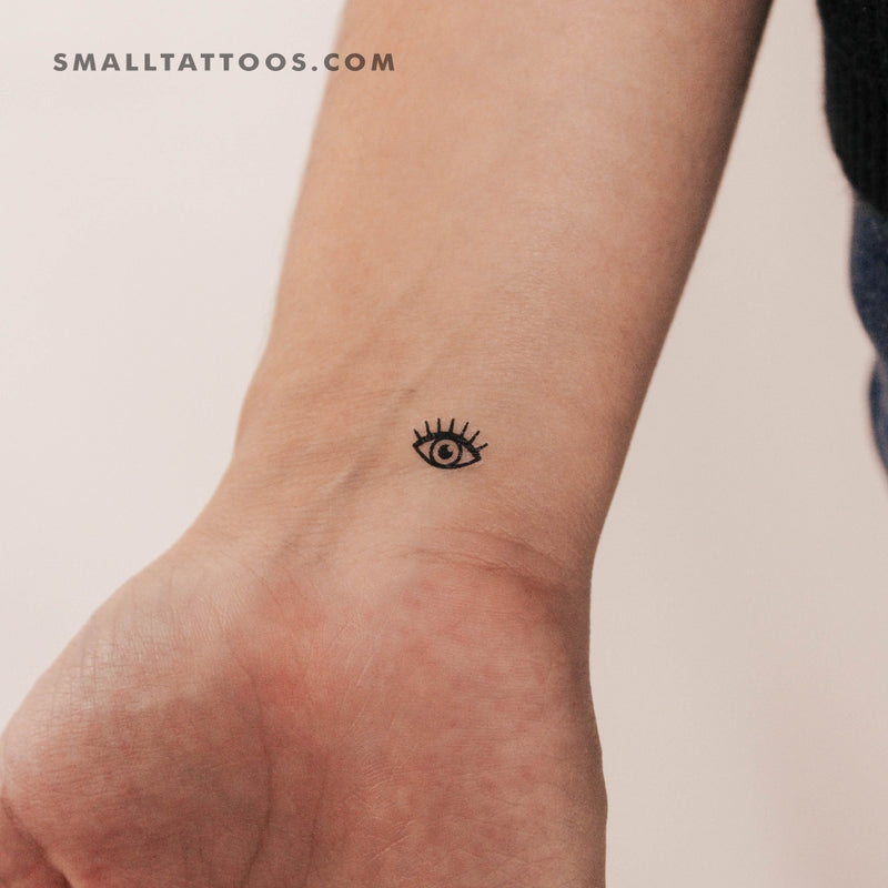 Premium Photo | A minimalist evil eye tattoo design created with generative  ai