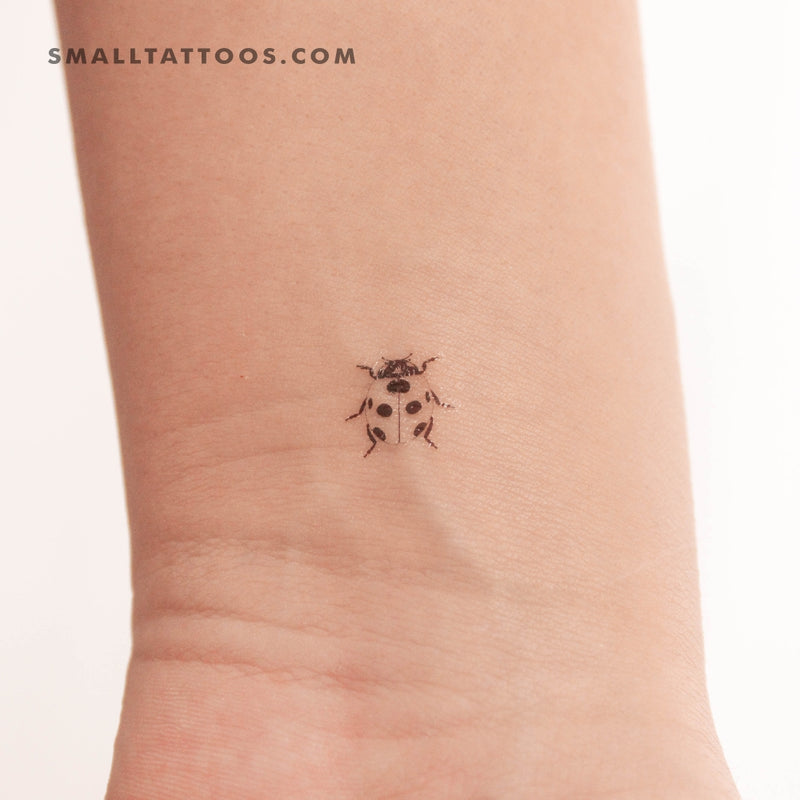 flowers and ladybug tattoo - Design of TattoosDesign of Tattoos
