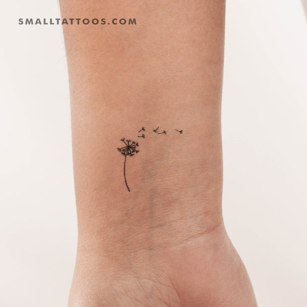 Dandelion seed tattoo on the right shoulder.