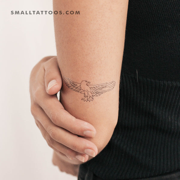 Micro-realistic eagle tattoo on the inner forearm.