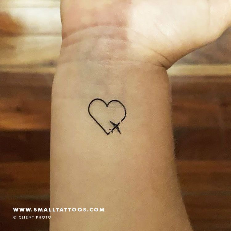 Tattoo tagged with: heart, airplane, globe, earth, arm | inked-app.com