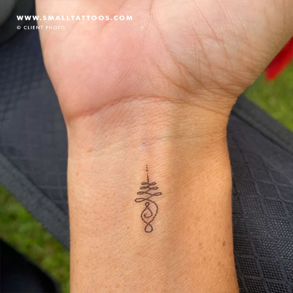 Tattoo tagged with: small, black, tiny, alex bawn, back of neck, little,  buddhist, blackwork, upper back, unalome, religious | inked-app.com