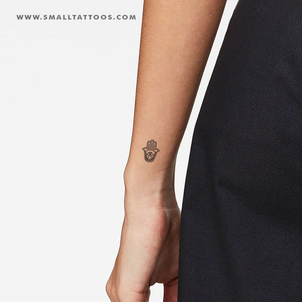 hamsa hand tattoo side