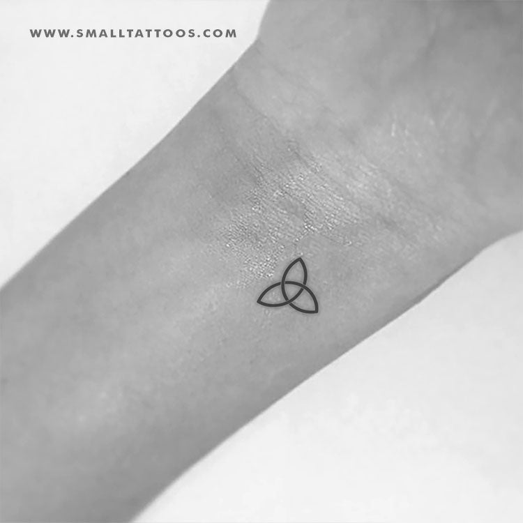 Skin Machine Tattoo Studio - Triquetra tattoos, also known as the Trinity  Knot, are a Celtic and Nordic symbol with pagan roots. Some pagans believe  the three interlocking parts of the triquetra